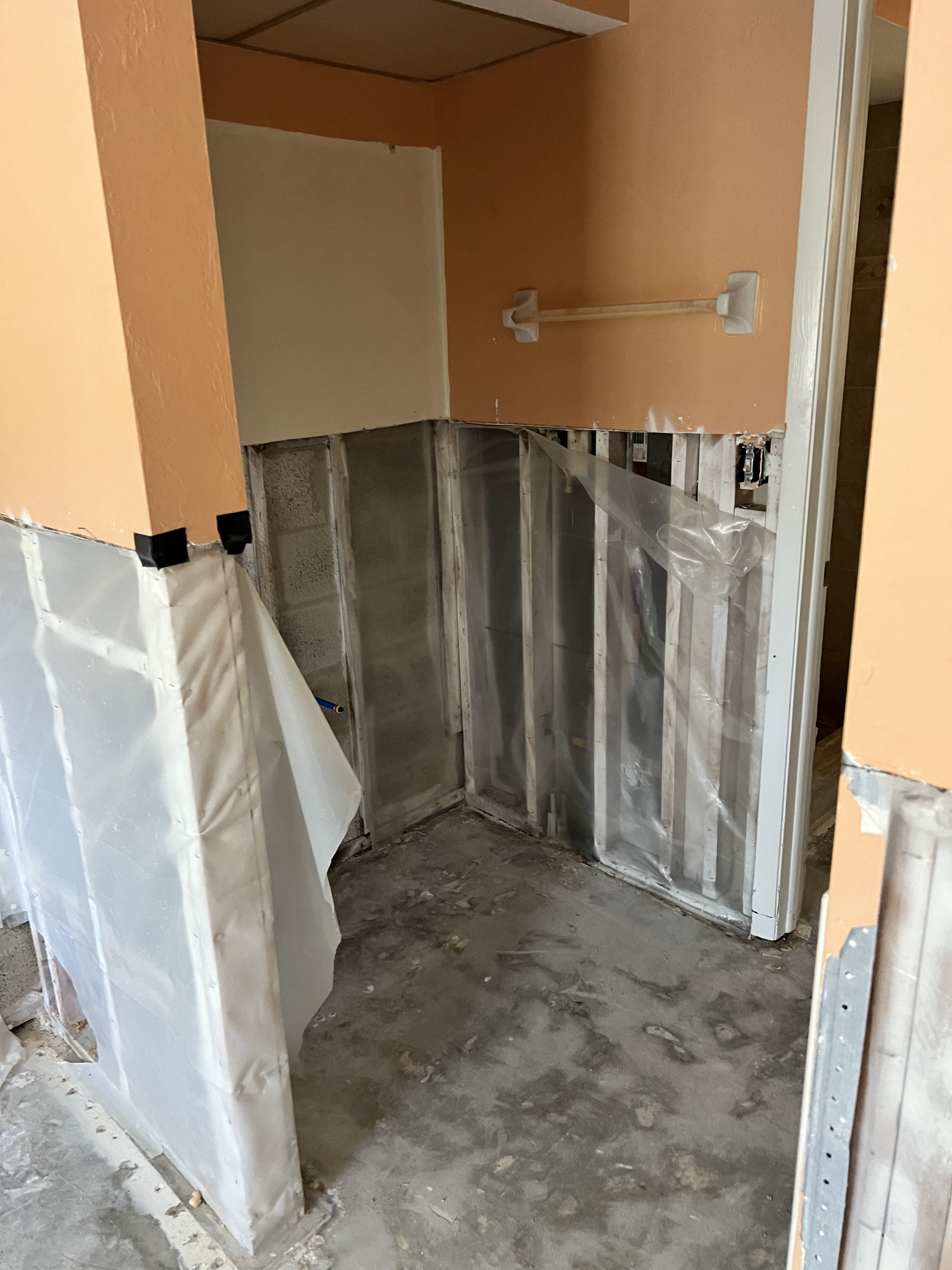 Bathroom removal of interior walls to four feet high and all existing flooring